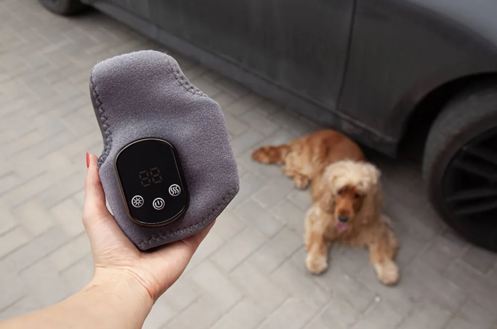 RejuvaFoot "Triple Therapy" Foot Massager held in one hand